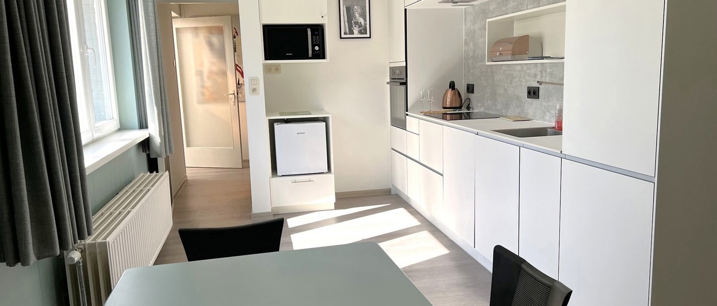 Gelijkvloerse verd. + tuin te koop in Genk